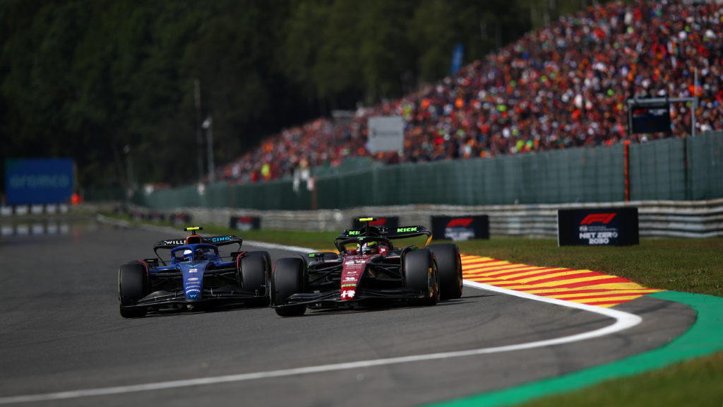 Zhou Guanyu of Alfa Romeo overtakes Logan Sargeant of Williams at F1 Belgian Grand Prix