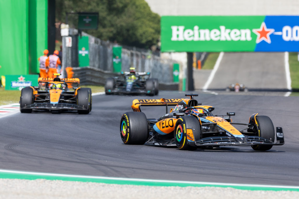 McLaren teammates Lando Norris and Oscar Piastri battle during F1 Italian GP
