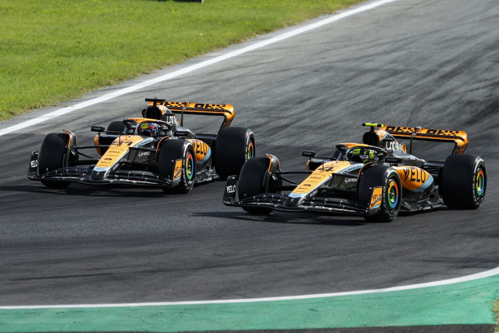 McLaren teammates Lando Norris and Oscar Piastri battle during F1 Italian GP