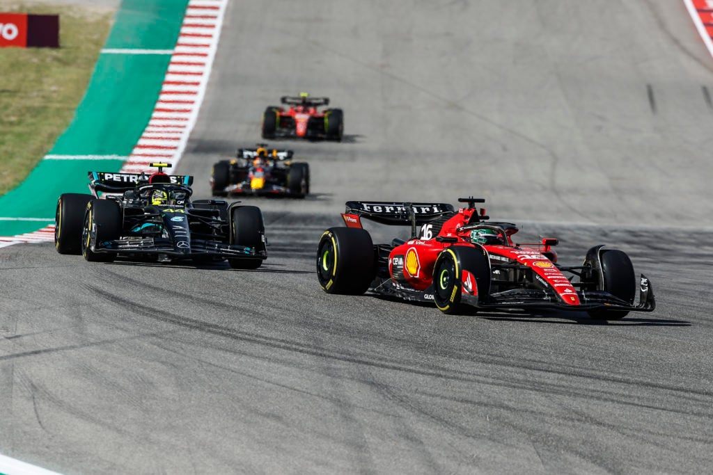 Mercedes driver Lewis Hamilton battling Charles Leclerc of Ferrari during United States GP before disqualification from podium finish