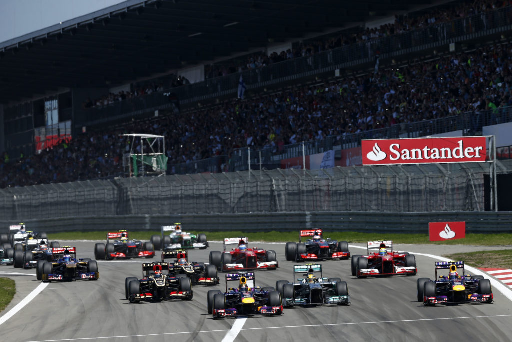 Red Bull driver Sebastian Vettel leads Lewis Hamilton of Mercedes en route to win 2013 F1 German GP