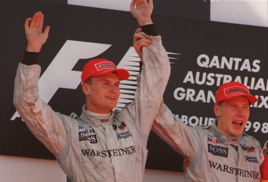 8 Mar 1998: McLaren-Mercedes drivers, David Coulthard of Great Britain (right) and Mika Hakkinen of Finland celebrate on the podium after the Aust...