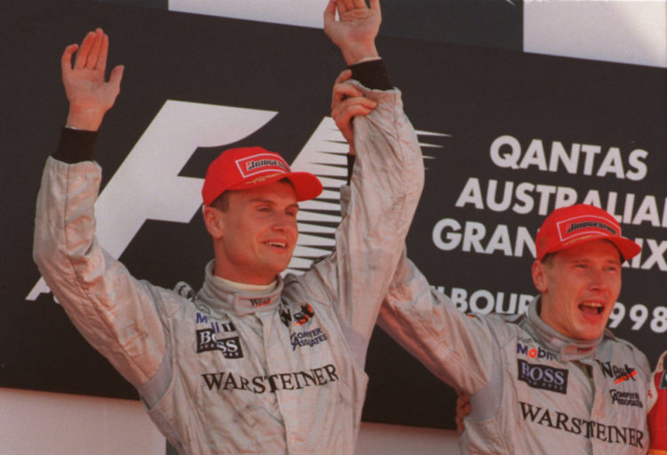 8 Mar 1998:  McLaren-Mercedes drivers, David Coulthard of Great Britain (right) and Mika Hakkinen of Finland celebrate on the podium after the Aust...