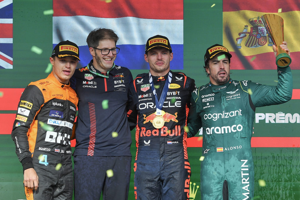 Red Bull driver Max Verstappen celebrates beating Lando Norris of McLaren to win Sao Paulo GP