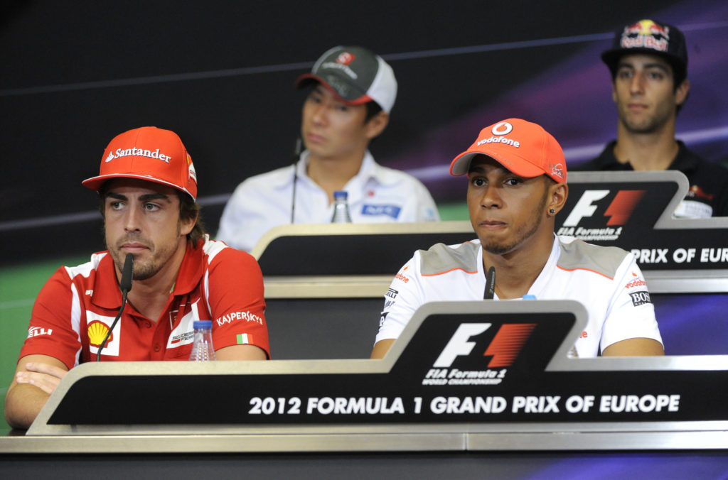 (L to R) Sauber's Japanese driver Kamui