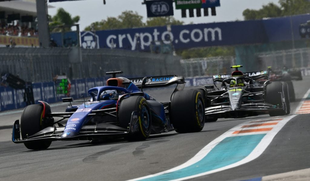 Williams driver Alex Albon and Lewis Hamilton of Mercedes during 2023 F1 Miami GP