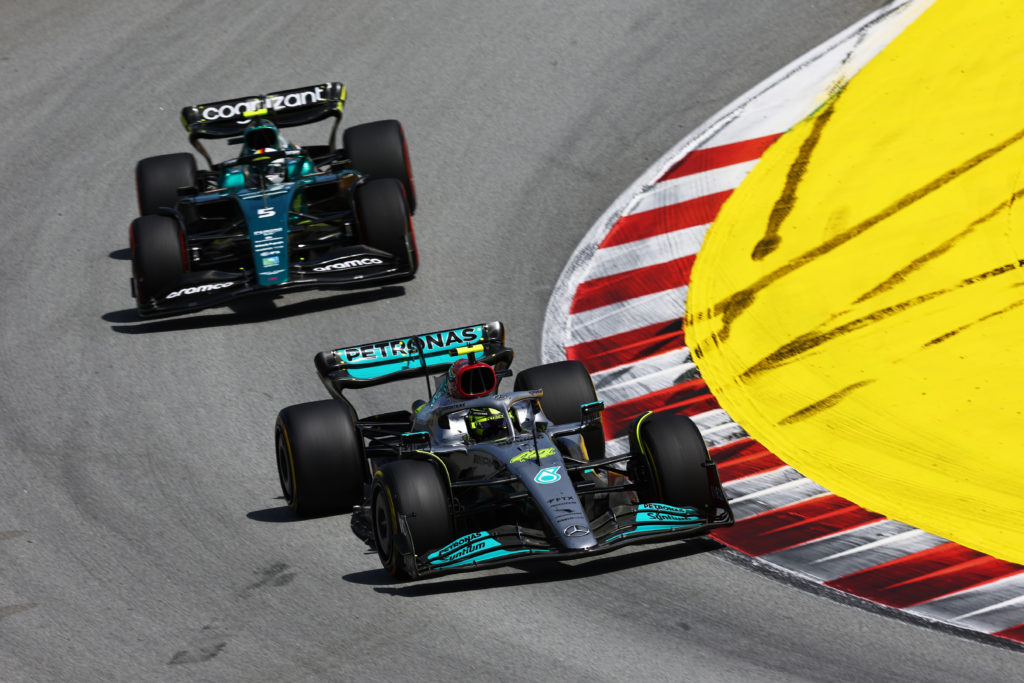 Mercedes driver Lewis Hamilton with Sebastian Vettel of Aston Martin at 2022 F1 Spanish GP