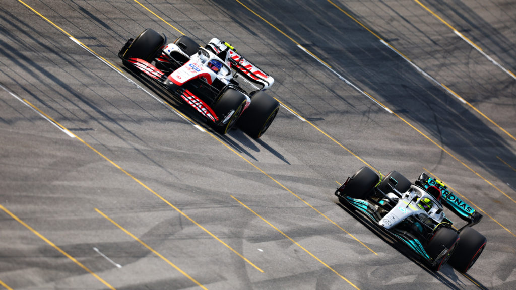 Haas driver Mick Schumacher and Mercedes star Lewis Hamilton at 2022 F1 Sao Paulo GP in Brazil