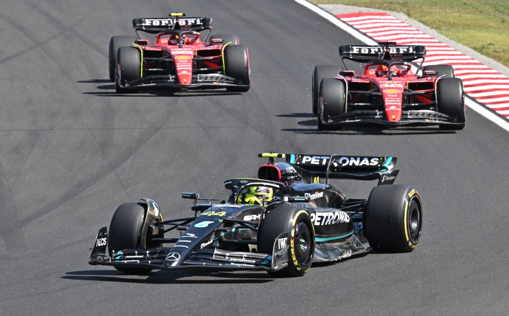 Mercedes driver Lewis Hamilton with Charles Leclerc and Carlos Sainz of Ferrari at 2023 F1 Hungarian GP