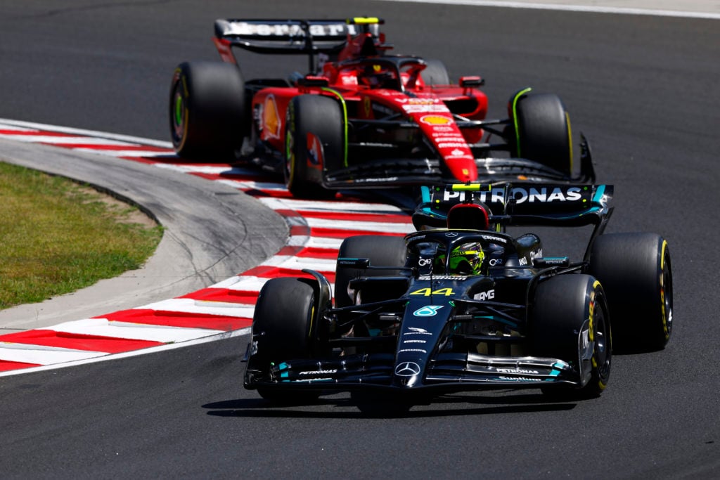 Ferrari driver Carlos Sainz and Lewis Hamilton of Mercedes during 2023 F1 Hungarian GP final practice