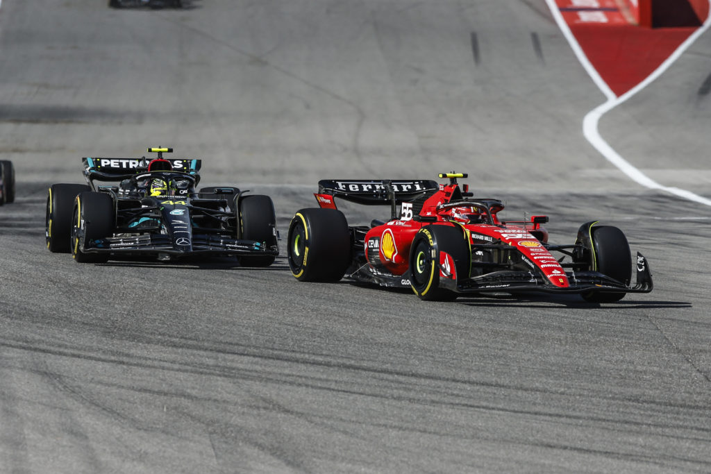 Mercedes driver Lewis Hamilton and Carlos Sainz of Ferrari during 2023 F1 United States GP