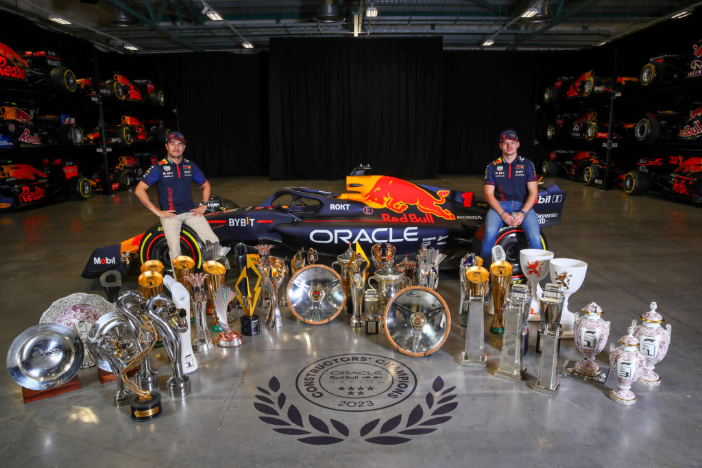 Red Bull drivers Sergio Perez and Max Verstappen with 2023 F1 trophy haul