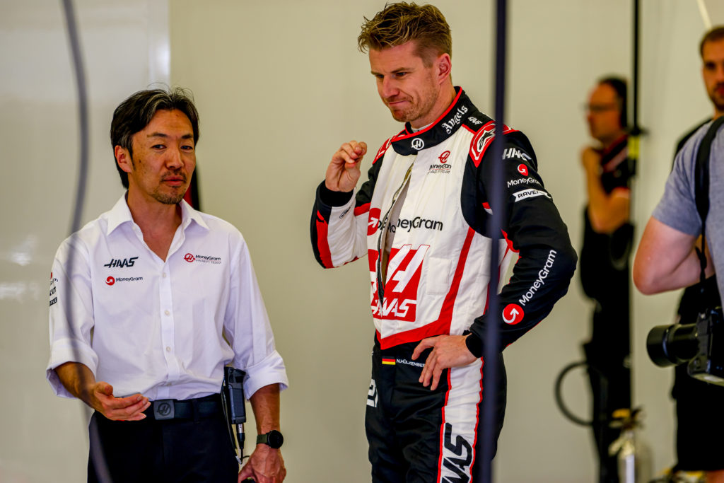 Haas driver Nico Hulkenberg with team principal Ayao Komatsu during F1 pre-season testing in Bahrain