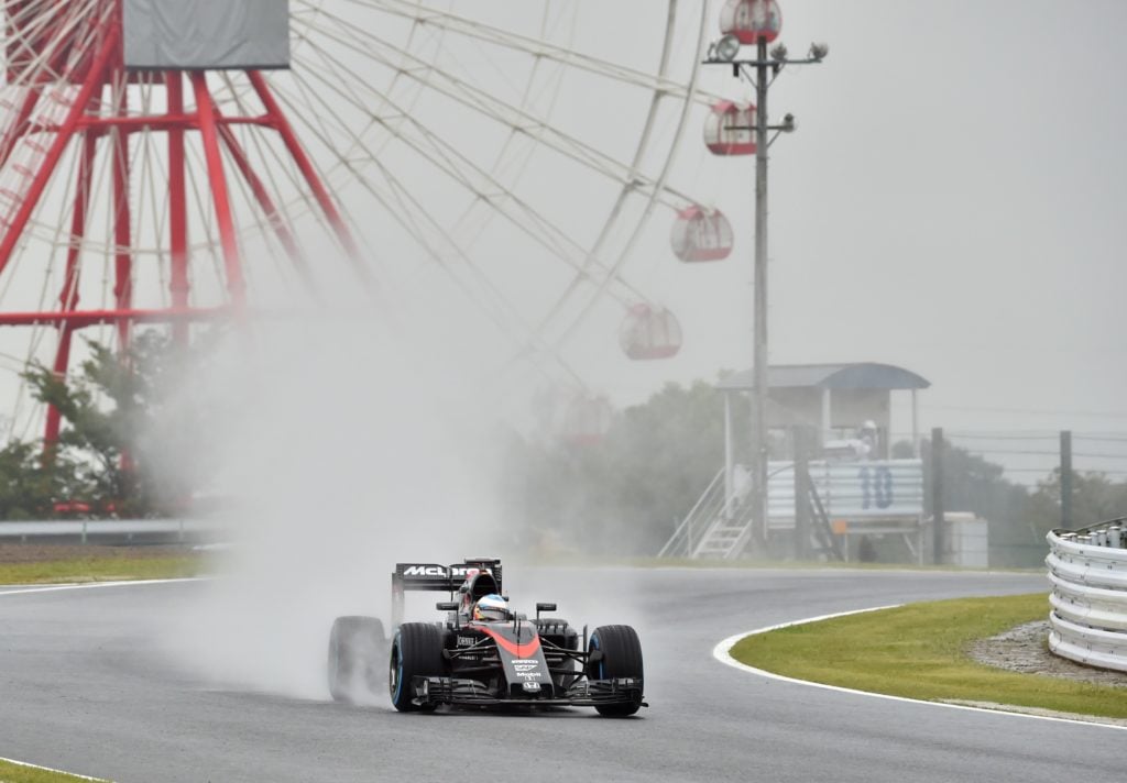 Aston Martin driver Fernando Alonso at 2015 F1 Japanese GP for McLaren amid Honda outburst