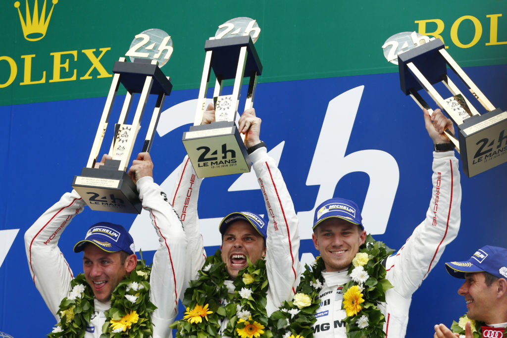 F1 driver Nico Hulkenberg celebrates winning 2015 24 Hours of Le Mans with Porsche