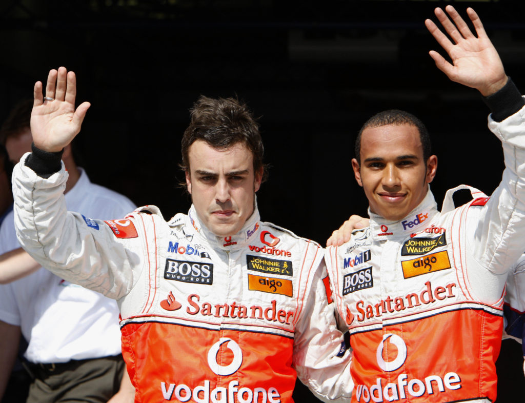 Aston Martin driver Fernando Alonso with Lewis Hamilton amid McLaren power struggle at 2007 F1 Hungarian GP