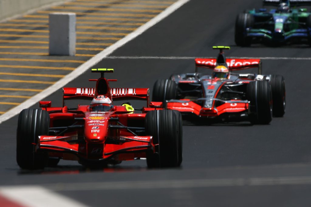 Ferrari driver Kimi Raikkonen ahead of Lewis Hamilton of McLaren at 2007 Brazil GP in Sao Paulo