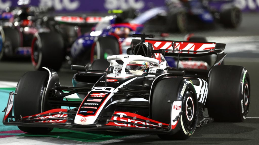 Haas driver Kevin Magnussen leads train of F1 drivers during 2024 Saudi Arabian GP