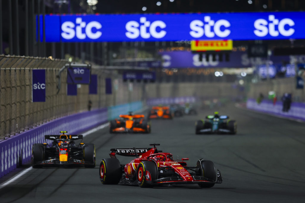 Red Bull driver Sergio Perez follows Charles Leclerc of Ferrari in 2024 F1 Saudi Arabian GP