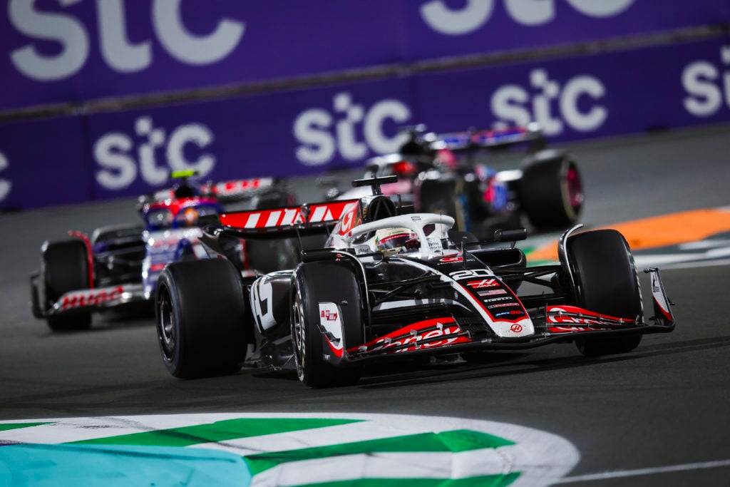 Haas driver Kevin Magnussen leads train of F1 drivers during 2024 Saudi Arabian GP