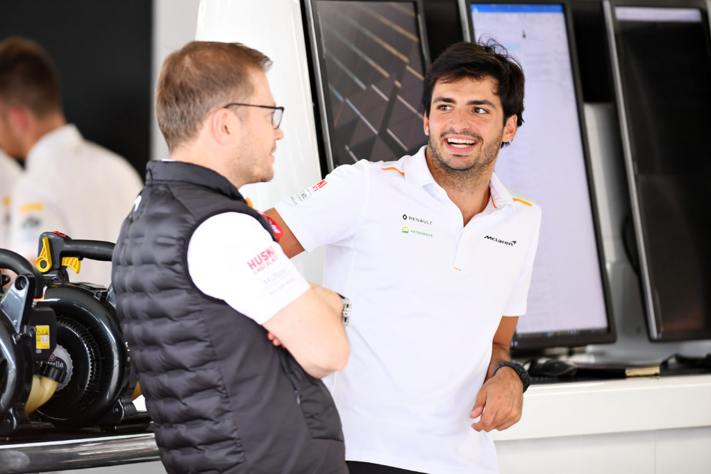 Ferrari F1 driver Carlos Sainz with Audi CEO Andreas Seidl at 2019 Japanese GP while both at McLaren