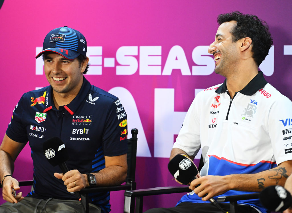 Sergio Perez of Red Bull and Visa Cash App driver Daniel Ricciardo at 2024 F1 pre-season testing