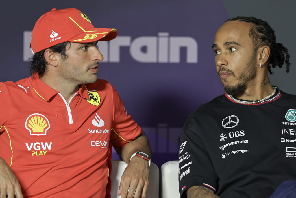 Carlos Sainz of Ferrari and Mercedes driver Lewis Hamilton at 2024 F1 Bahrain GP