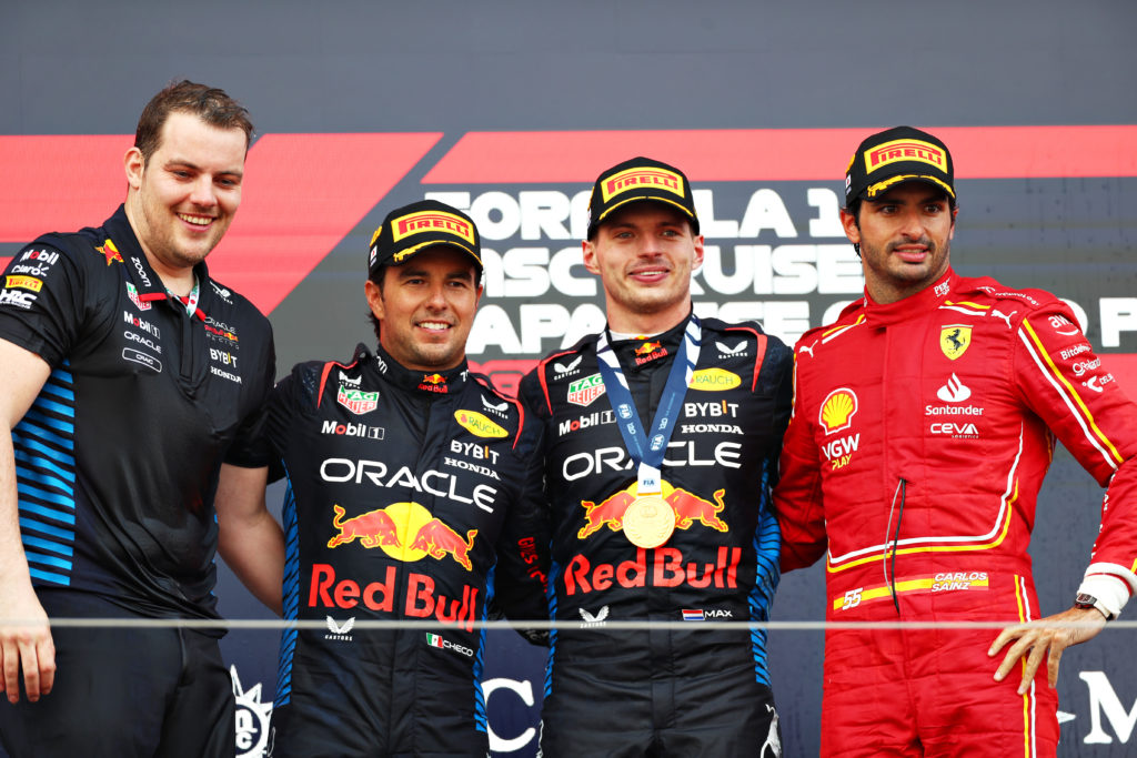 Red Bull drivers Sergio Perez and Max Verstappen with Carlos Sainz of Ferrari on 2024 F1 Japanese GP podium
