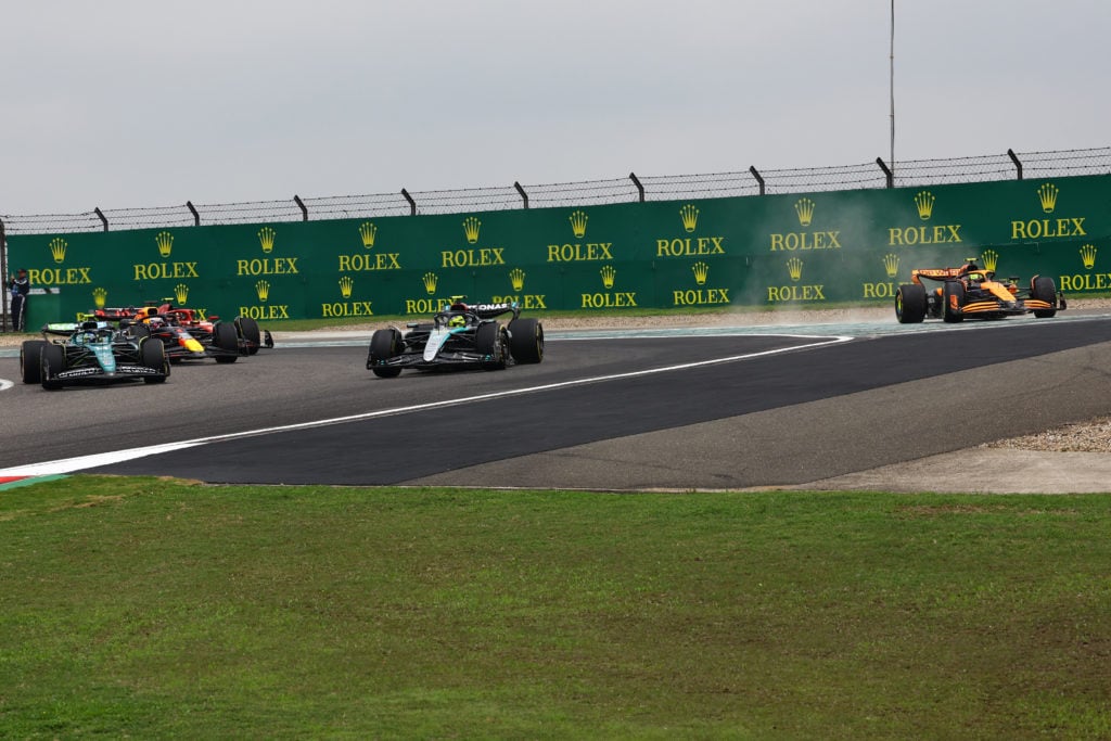 Mercedes driver Lewis Hamilton overtakes Lando Norris of McLaren in F1 Sprint at 2024 Chinese GP