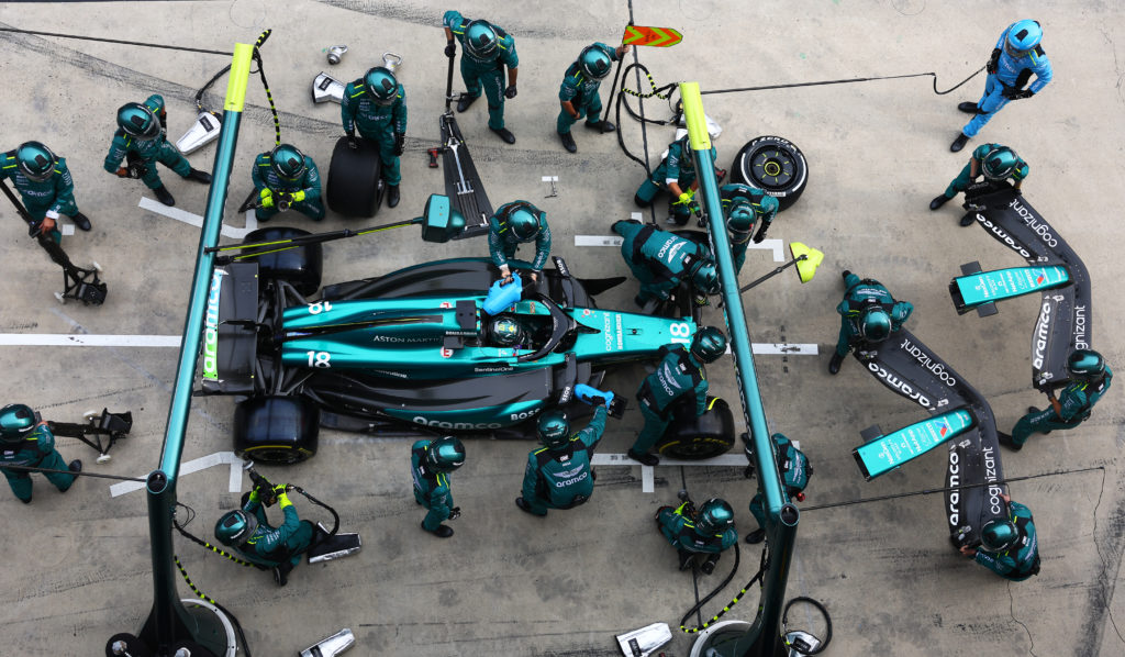 Aston Martin driver Lance Stroll changes his front wing in 2024 F1 Chinese GP