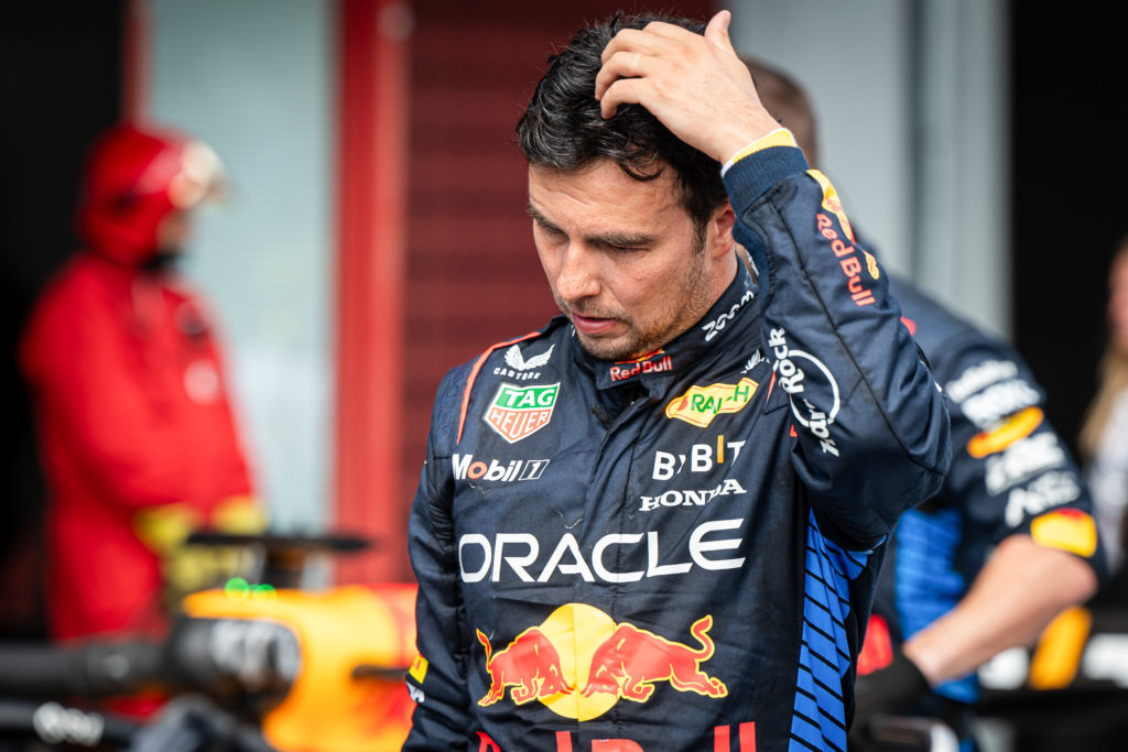 Oracle Red Bull Racing's Mexican driver Sergio Perez reacts