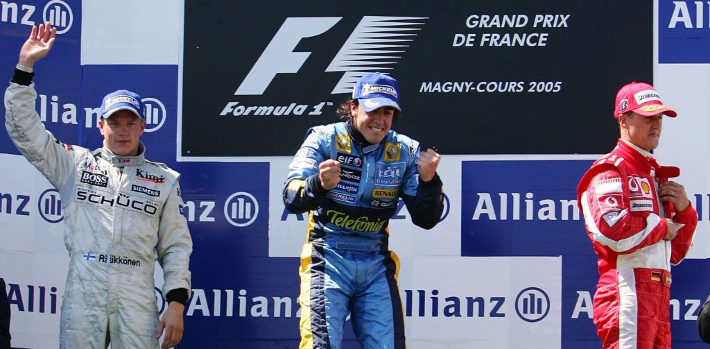 Fernando Alonso of Renault celebrates winning the 2005 French Grand Prix