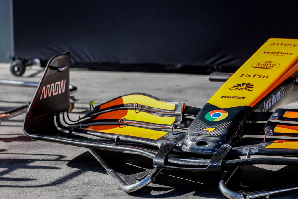 The McLaren MCL38 front wing in pit lane during setup day