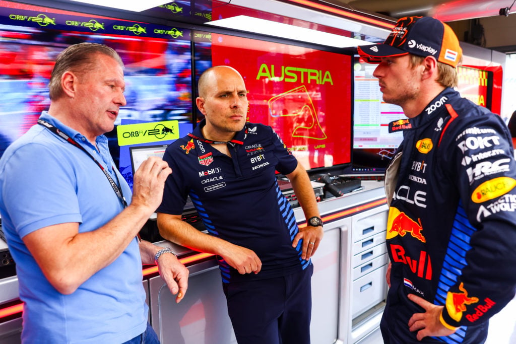 Jos Verstappen, GP Lambiase and Max Verstappen chatting in the Red Bull garage in Austria