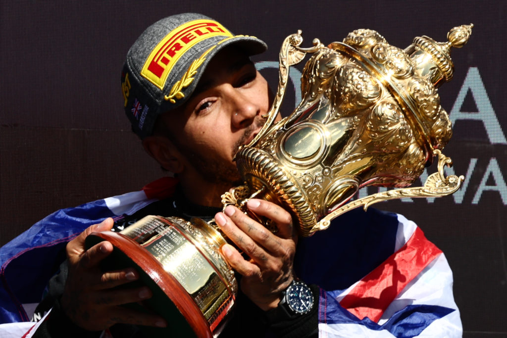 Lewis Hamilton celebrates winning the 2024 F1 British Grand Prix at Silverstone for Mercedes