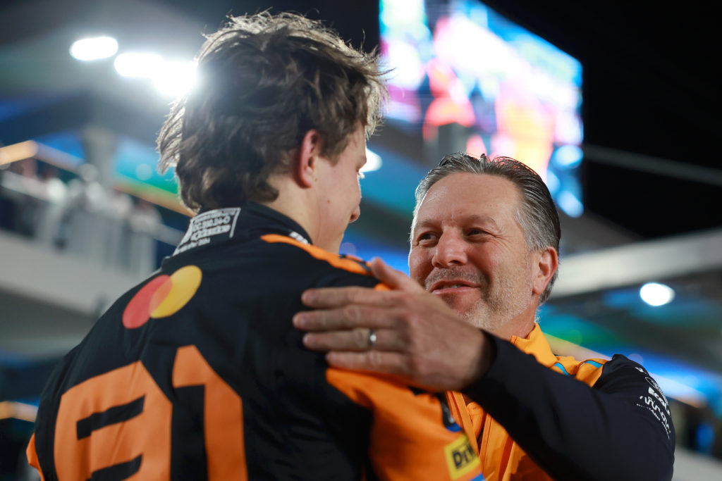 McLaren CEO Zak Brown embraces Oscar Piastri at the 2024 Qatar Grand Prix