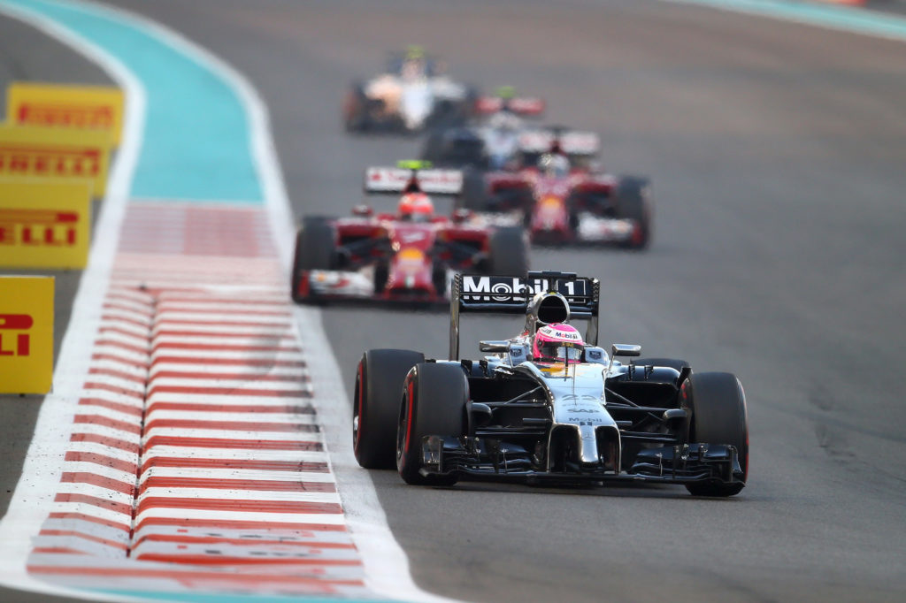 Jenson Button of McLaren drives during the 2014 F1 Abu Dhabi Grand Prix