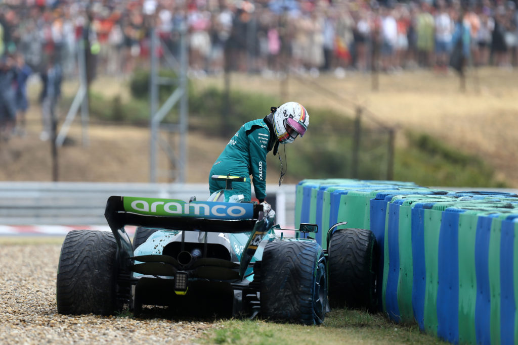 Sebastian Vettel of Aston Martin after the crash during