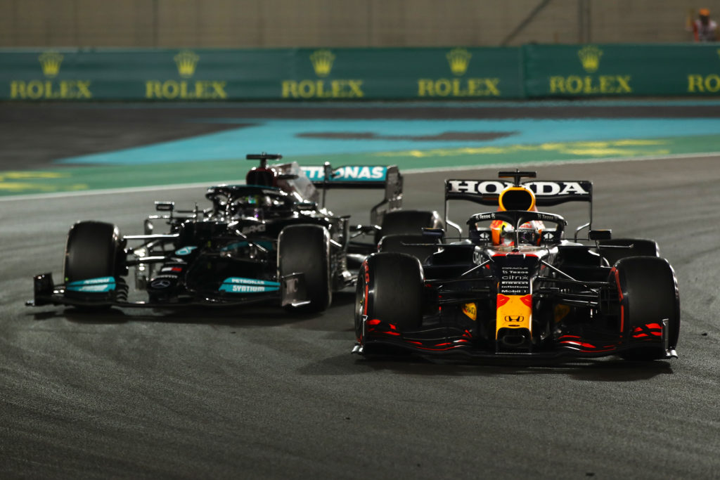 Red Bull's Max Verstappen overtakes Mercedes' Lewis Hamilton to win the 2021 F1 drivers' title in Abu Dhabi