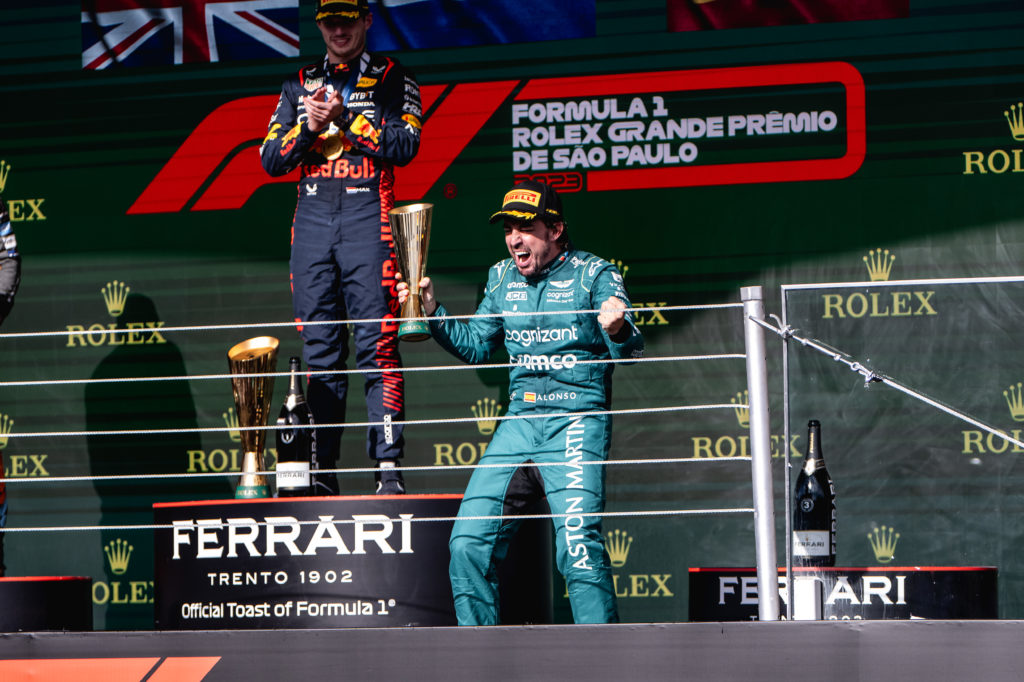 Fernando Alonso celebrates his podium for Aston Martin at the 2023 Brazilian Grand Prix.
