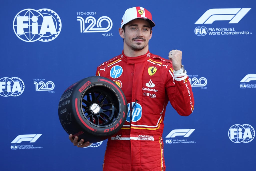 Charles Leclerc of Scuderia Ferrari celebrates pole