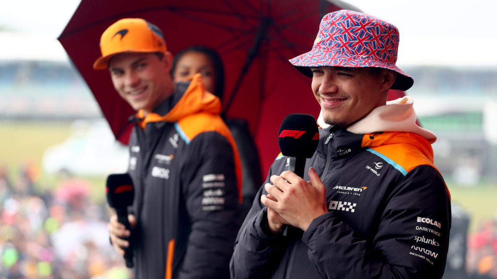 McLaren drivers Lando Norris and Oscar Piastri speak at a fans' forum at the 2024 F1 British Grand Prix at Silverstone