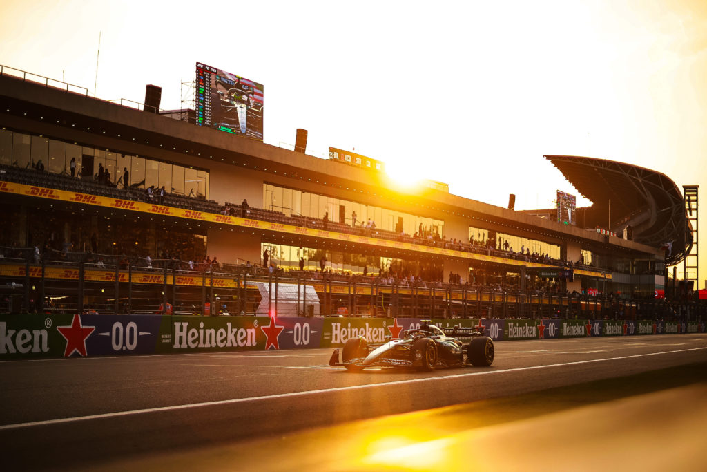 Fernando Alonso drives past the pit wall at the Mexico City Grand Prix
