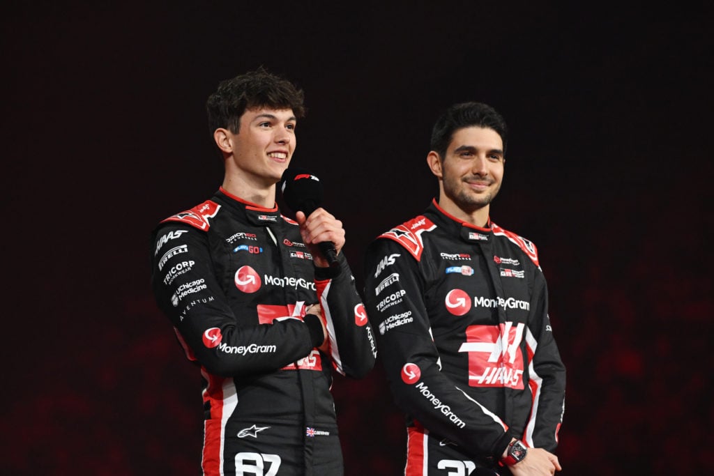 Oliver Bearman and Esteban Ocon stand onstage at the F1 75 Car Launch
