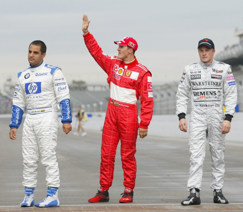 Michael Schumacher of Germany and Ferrari on his way to a photo session