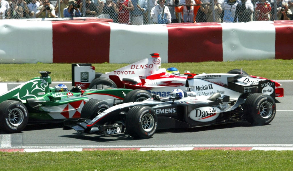 British F1 driver David Coulthard (R) of