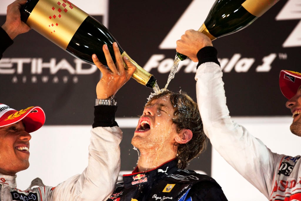 Sebastian Vettel, Lewis Hamilton, Jenson Button, Winners Podium, 2010 Abu Dhabi Grand Prix