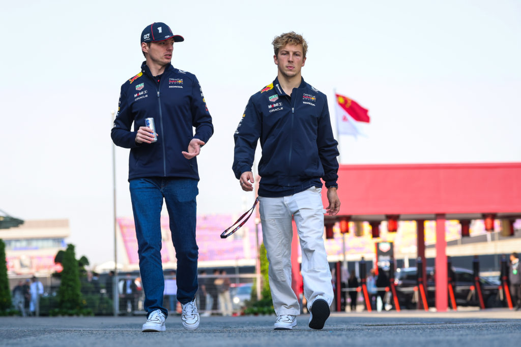 Red Bull drivers Max Verstappen and Liam Lawson in the paddock at the 2025 Chinese Grand Prix