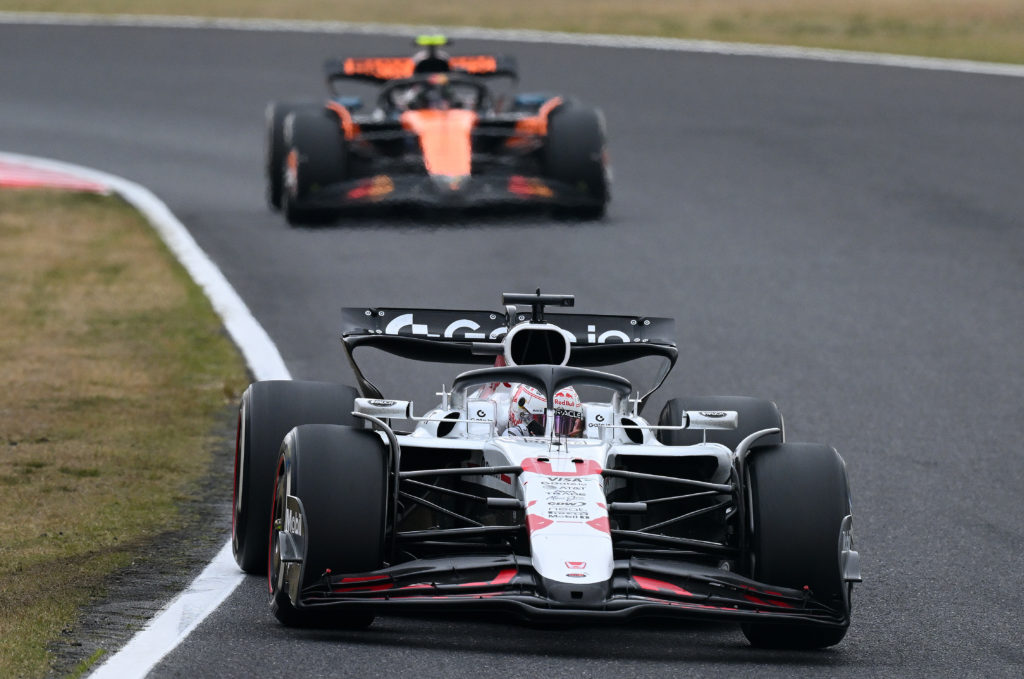 Max Verstappen leading a McLaren at the 2025 Japanese Grand Prix