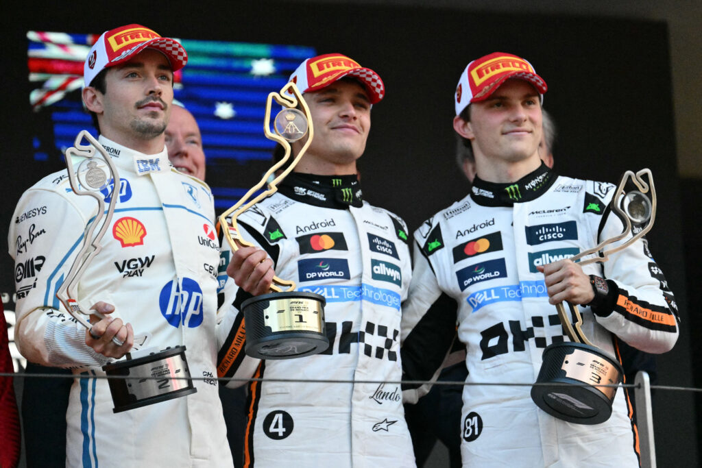 Charles Leclerc, Lando Norris and Oscar Piastri on the 2025 F1 Monaco Grand Prix podium